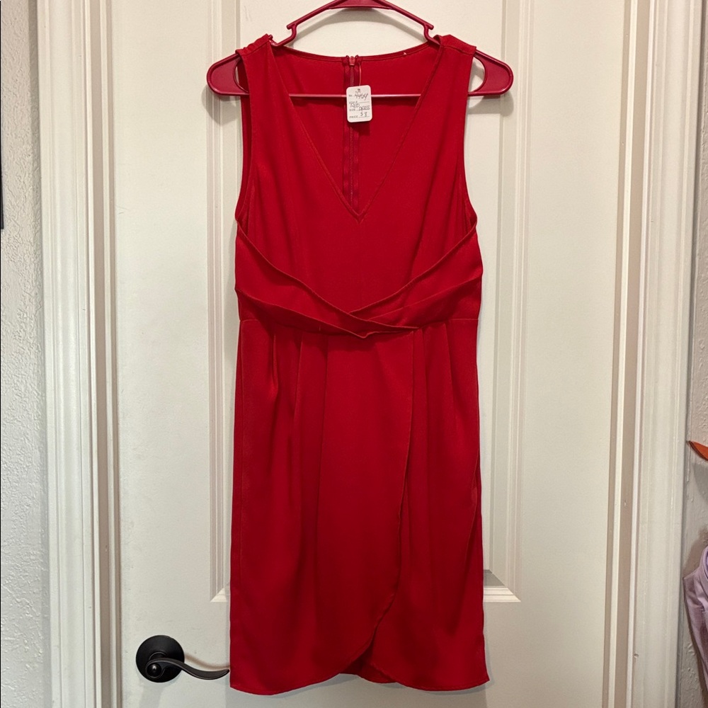Elegant Red Sleeveless Dress fits like a small. No tag